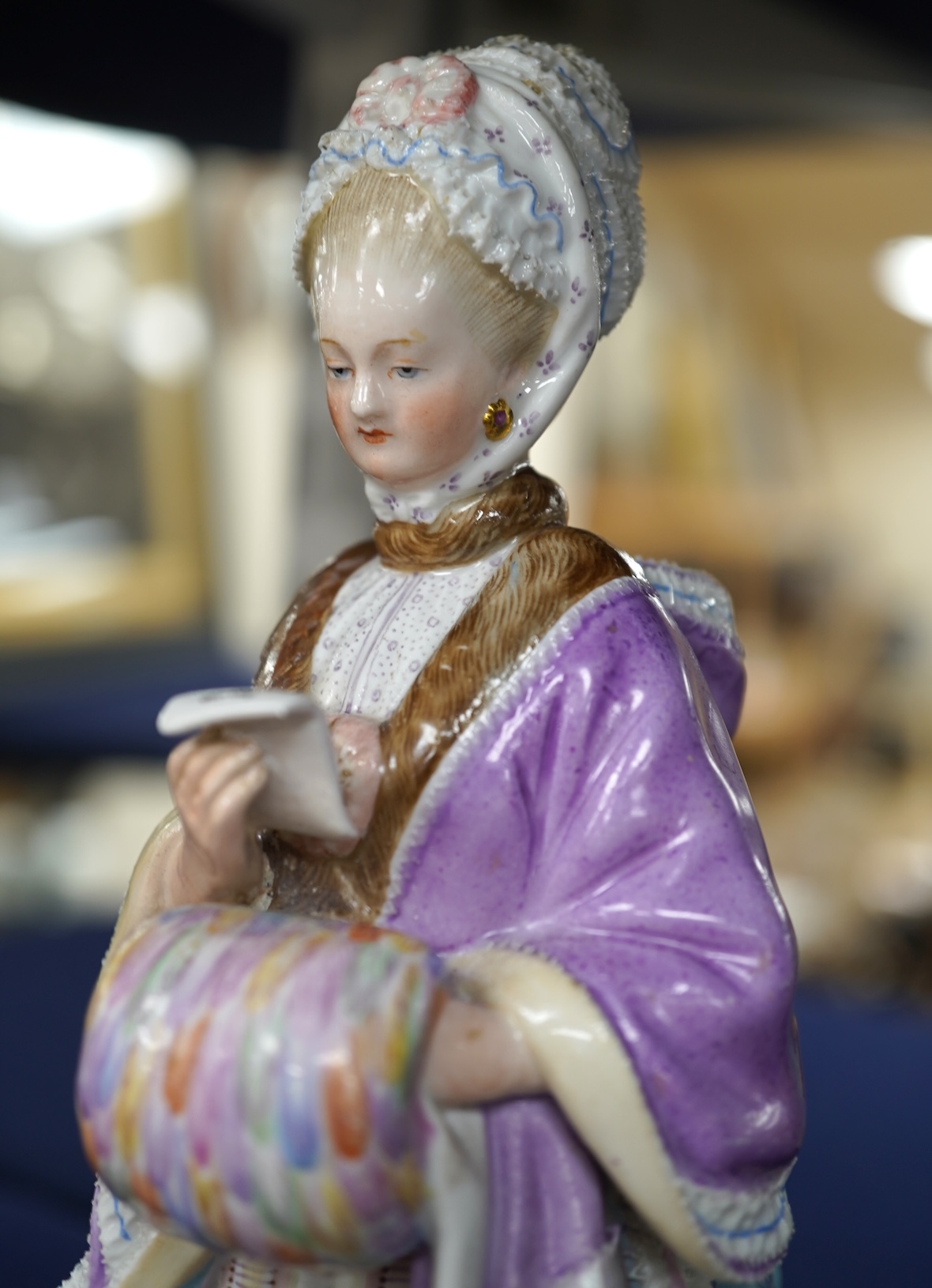 A Meissen porcelain figure, The Racegoers Companion, after Acier, incised number D66, 20cm
